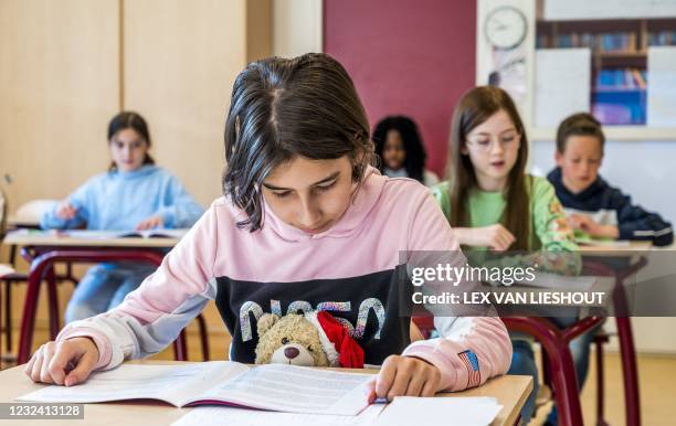 School pupils in Leiderdorp study the Central Final Test, one of the five permitted final tests at a primary school, on April 20, 2021. - More than...