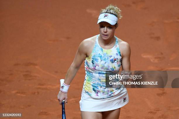 Germany's Laura Siegemund reacts after winning a point in the third set against Germany's Mona Barthel after winning their singles match on day 2 of...