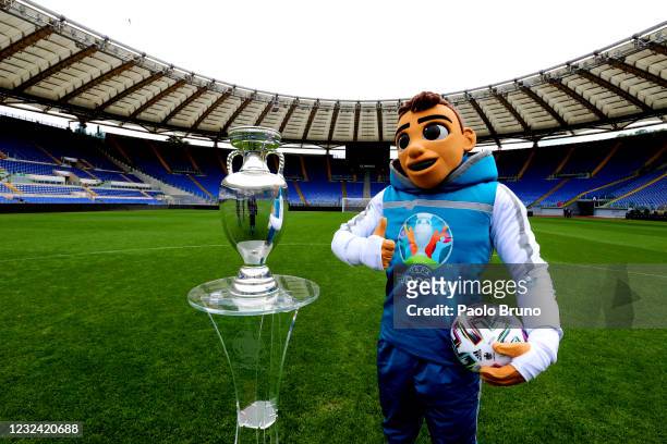 The Mascotte Skillzy poses with the trophy in Stadio Olimpico during the UEFA Euro 2020 Trophy Tour of Rome on April 20, 2021 in Rome, Italy.