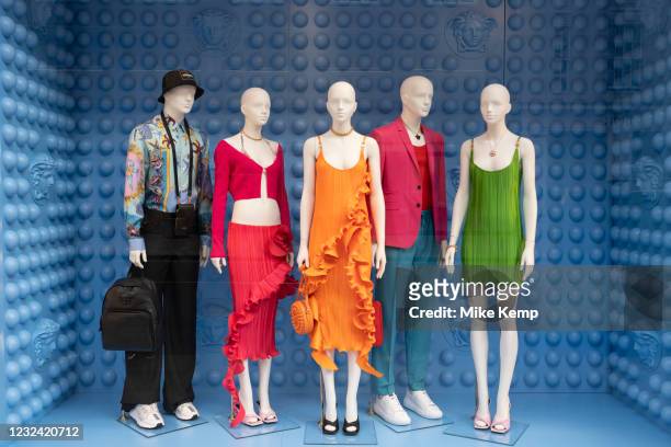 Colourful mannequins shopping window display outside the Versace store in the upmarket area of Knightsbridge on 14th April 2021 in London, United...
