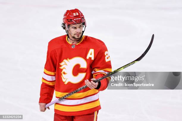 Calgary Flames Center Sean Monahan skates without gloves during a break in play during the second period of an NHL game where the Calgary Flames...