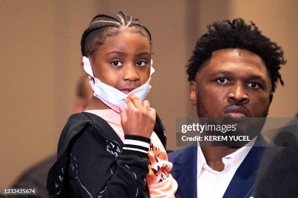 George Floyd's 6-year-old daughter Gianna Floyd looks on during a press conference following the verdict in the trial of former police officer Derek...