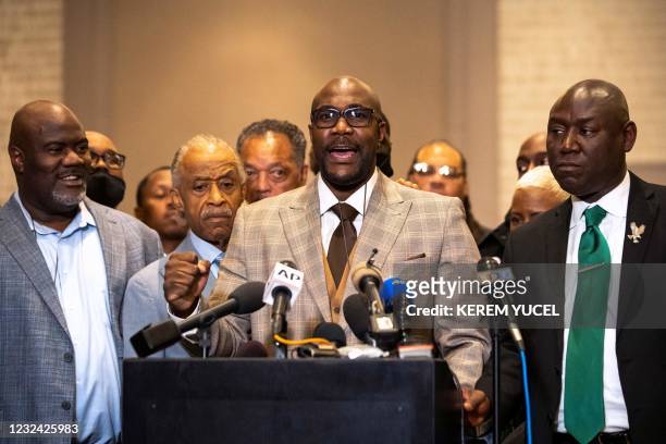 George Floyd's brother Philonise Floyd speaks flanked by Reverend Al Sharpton and Attorney Ben Crump during a press conference following the verdict...