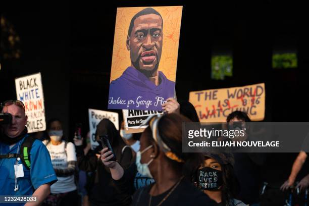 People march following the guilty verdict in the trial of Derek Chauvin on April 20 in Atlanta, Georgia. - Derek Chauvin, a white former Minneapolis...