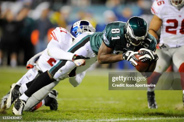Nov 9, 2008; Philadelphia, PA, USA; Philadelphia Eagles wide receiver Jason Avant scores a touchdown as New York Giants safety Kenny Phillips defends...