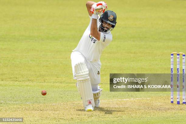 Bangladesh's Tamim Iqbal plays a shot during the first day of the first Test cricket match between Sri Lanka and Bangladesh at the Pallekele...