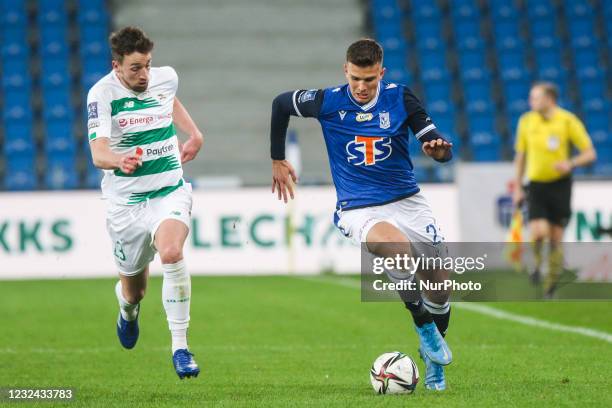 Filip Szymczak and Mario Maloca in action during PKO Ekstraklasa Polish Football Extraleague match between Lech Poznan and Lechia Gdansk in Poznan,...