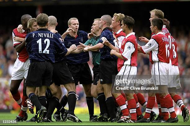 Tempers flare up as the two teams clash during the FA Carling Premiership match between Manchester United and Arsenal played at Highbury in London,...