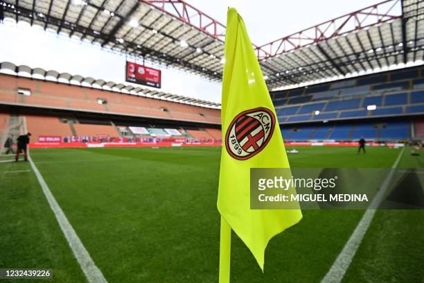 The logo of AC Milan is pictured on a corner flag prior to the Italian Serie A football match AC Milan vs Sassuolo on April 21, 2021 at the San Siro...