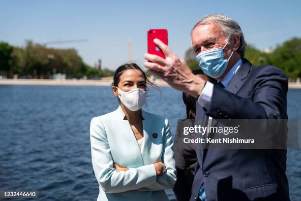 Rep. Alexandria Ocasio-Cortez , Sen. Ed Markey , and Rep. Cori Bush record a video following a news conference to reintroduce the Green New Deal and...