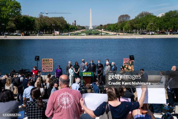 Sen. Ed Markey speaks at a news conference to reintroduce the Green New Deal and introduce the Civilian Climate Corps Act at the Capitol Reflecting...