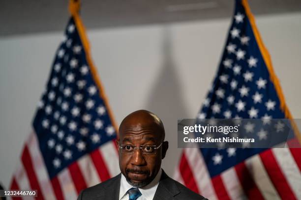 Sen. Raphael Warnock speaks during a news conference following a Senate Democratic policy luncheon on Capitol Hill on Tuesday, April 20, 2021 in...