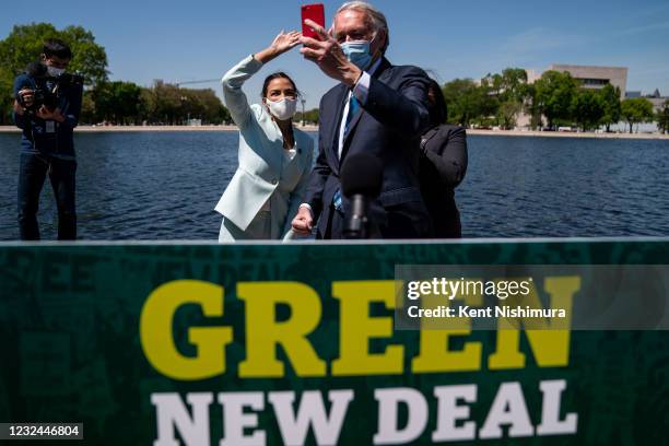 Rep. Alexandria Ocasio-Cortez , Sen. Ed Markey , and Rep. Cori Bush record a video following a news conference to reintroduce the Green New Deal and...