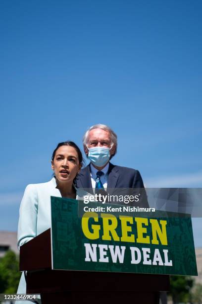 Rep. Alexandria Ocasio-Cortez and Sen. Ed Markey at a news conference to reintroduce the Green New Deal and introduce the Civilian Climate Corps Act...