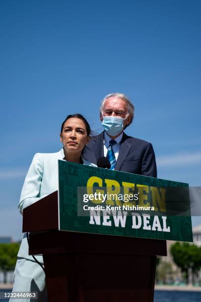 Rep. Alexandria Ocasio-Cortez and Sen. Ed Markey at a news conference to reintroduce the Green New Deal and introduce the Civilian Climate Corps Act...