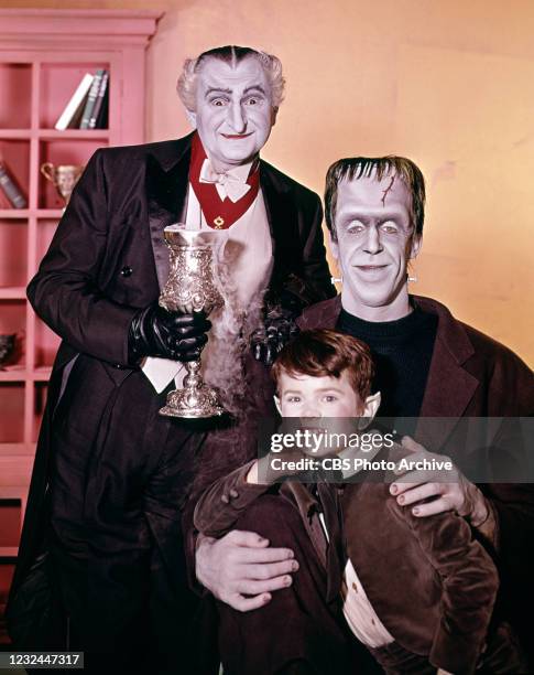 Pictured from left is Beverley Owen , Al Lewis , Yvonne De Carlo , Fred Gwynne , Butch Patrick in the CBS series, THE MUNSTERS. Premier episode aired...