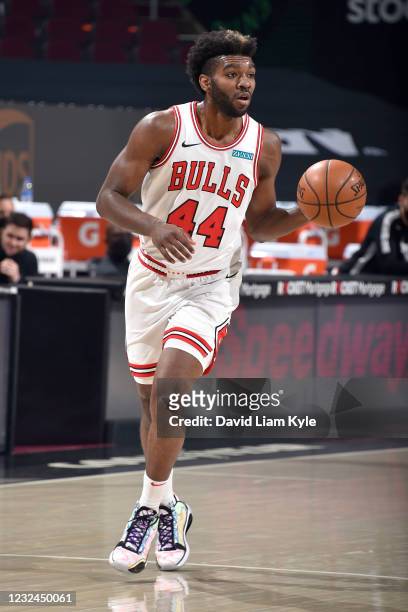 Patrick Williams of the Chicago Bulls dribbles the ball during the game against the Cleveland Cavaliers on April 21, 2021 at Rocket Mortgage...
