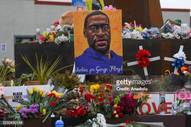 People lay flowers at a memorial in George Floyd Square in Minneapolis, Minnesota, United States on April 21, 2021. George Floyd by the Cup Foods...