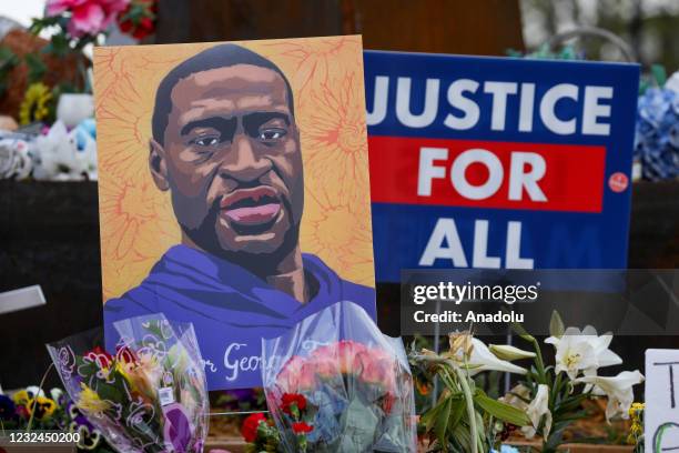People lay flowers at a memorial in George Floyd Square in Minneapolis, Minnesota, United States on April 21, 2021. George Floyd by the Cup Foods...