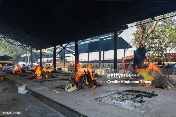 View Nigambodh Ghat crematorium during the cremation of multiple Covid-19 victims, on April 21, 2021 in New Delhi, India.
