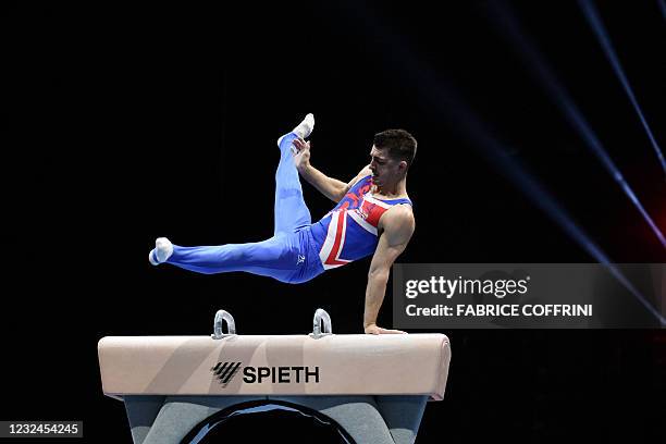 Britain's Max Whitlock competes in the Men's pommel horse qualifications during European Artistic Gymnastics Championships at the St Jakobshalle, in...