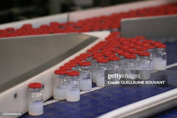 This picture taken in Monts, central France, on April 22 shows vials of the Moderna Covid-19 disease vaccine at Recipharm plant. Recipharm has been...