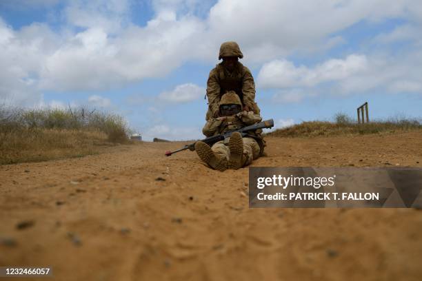 United States Marine Corps recruits from Lima Company, the first gender integrated training class in San Diego, perform a casualty drag during The...