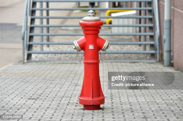 April 2021, Saxony, Leipzig: A hydrant is located at a shopping centre in Leipzig. Photo: Volkmar Heinz/dpa-Zentralbild/ZB