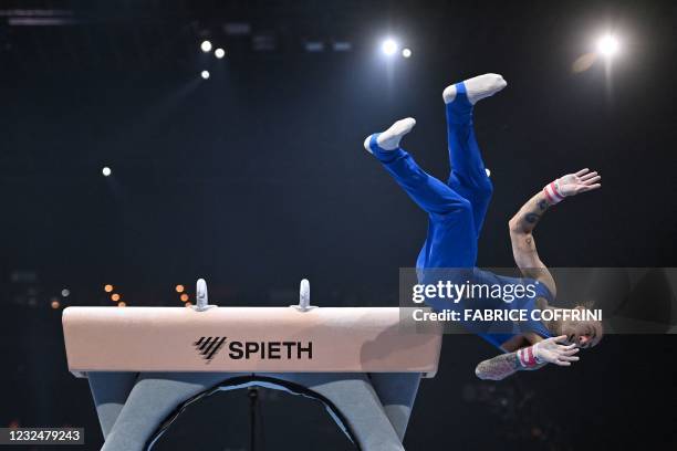 Italy's Nicola Bartolini falls as he competes in the pommel horse competition during the Men's all-around final of the 2021 European Artistic...