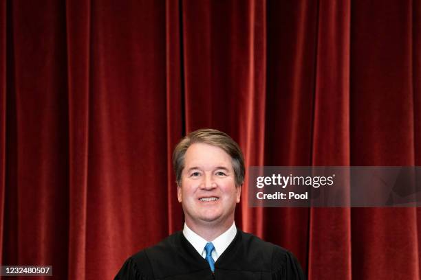 Associate Justice Brett Kavanaugh stands during a group photo of the Justices at the Supreme Court in Washington, DC on April 23, 2021.