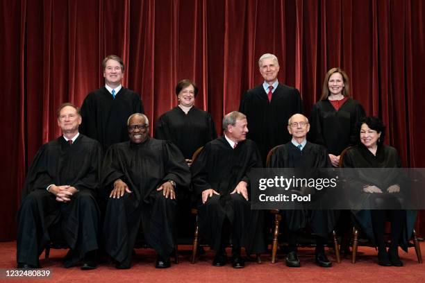 Members of the Supreme Court pose for a group photo at the Supreme Court in Washington, DC on April 23, 2021. Seated from left: Associate Justice...