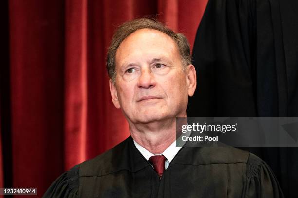 Associate Justice Samuel Alito sits during a group photo of the Justices at the Supreme Court in Washington, DC on April 23, 2021.