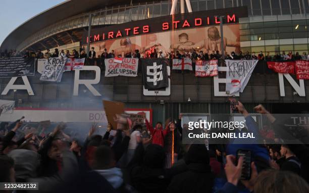 Supporters protest against Arsenal's US owner Stan Kroenke, outside English Premier League club Arsenal's Emirates stadium in London on April 23...