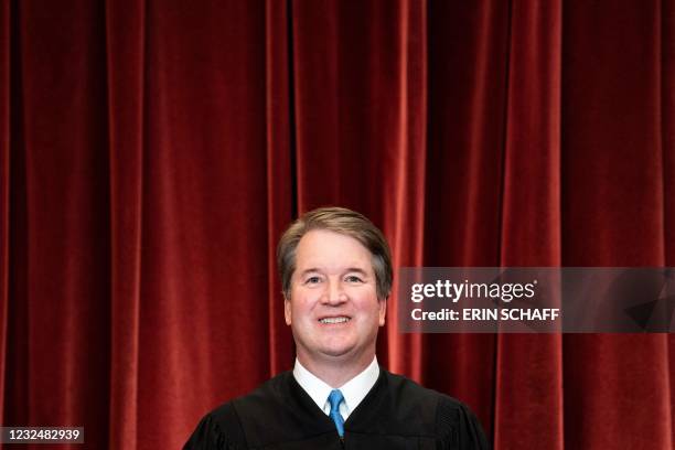 Associate Justice Brett Kavanaugh stands during a group photo of the Justices at the Supreme Court in Washington, DC on April 23, 2021.