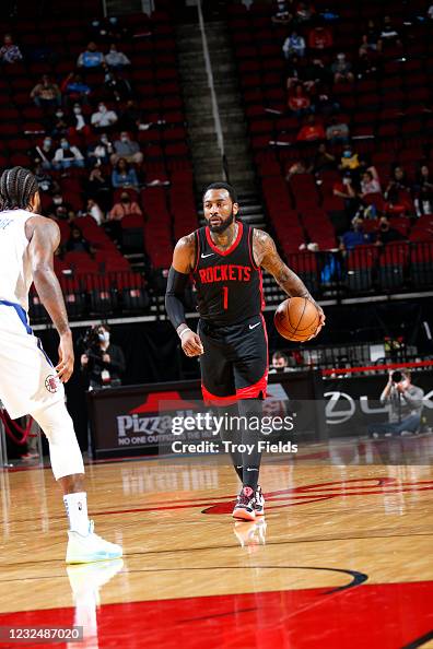 John Wal Rockets John Wall of the Houston Rockets dribbles against the Los Angeles ...