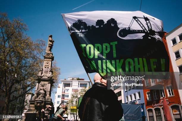 Stop the coal flag is seen during the Fridays for Future rallies against American president Joe Biden's Climate Summit comment in Cologne, Germany on...