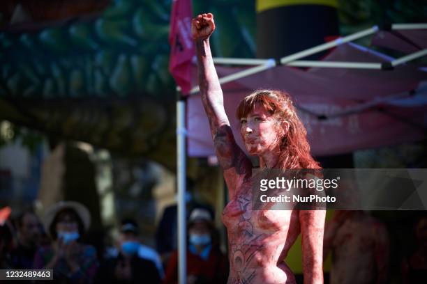 Dancer raises her fist during the gathering. Culture workers , unions , students and collectives organized a gathering behind the cityhall of...