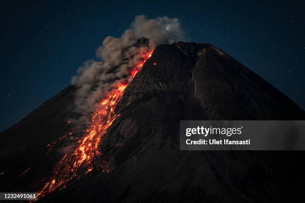 Mount Merapi spews pyroclastic flow as the volcanic activity increases on April 24, 2021 in Yogyakarta, Indonesia. Authorities issued a level three...