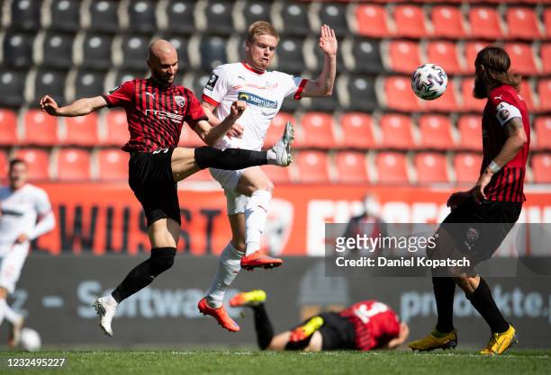 Nico Antonitsch of Ingolstadt in action with Lars Lokotsch of Zwickau during the 3. Liga match between FC Ingolstadt 04 and FSV Zwickau at Audi...