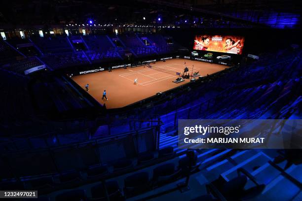 Empty seats are seen around the court as Ukraine's Elina Svitolina plays during her singles semi-final match against Australia's Ashleigh Barty of...