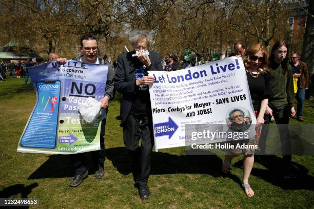 Peirs Corbyn uses a tissue during a "Unite For Freedom" anti-lockdown demonstration held to protest against the use of vaccine passports in the...