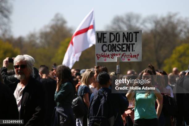 Protestor takes a photo of a placard during a "Unite For Freedom" anti-lockdown demonstration held to protest against the use of vaccine passports in...