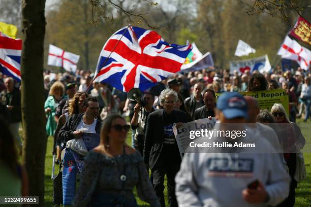 Piers Corbyn walks with protestors during a "Unite For Freedom" anti-lockdown demonstration held to protest against the use of vaccine passports in...