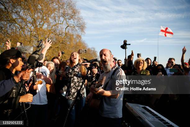 Musician plays music to protestors during a "Unite For Freedom" anti-lockdown demonstration held to protest against the use of vaccine passports in...