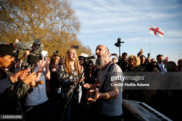 Musician plays music to protestors during a "Unite For Freedom" anti-lockdown demonstration held to protest against the use of vaccine passports in...