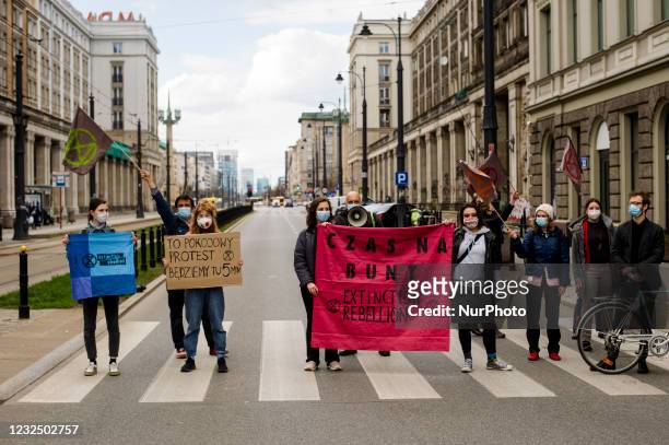 Climate activists gathered in a few places in Warsaw, Poland, forming short - 5 minutes long only - roadblocks. The aim was to raise awareness of...