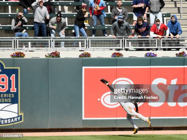 Phillip Evans of the Pittsburgh Pirates is unable to catch a double by Jake Cave of the Minnesota Twins during the eighth inning of the game at...