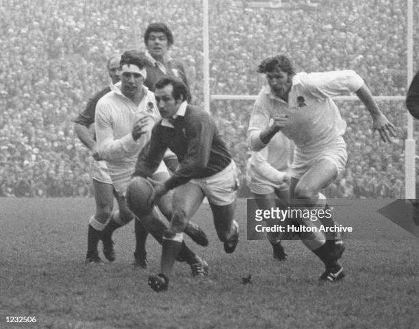 Scrum Half Gareth Edwards of Wales makes a break during the Five Nations match against England at Twickenham. Mandatory Credit: Allsport...