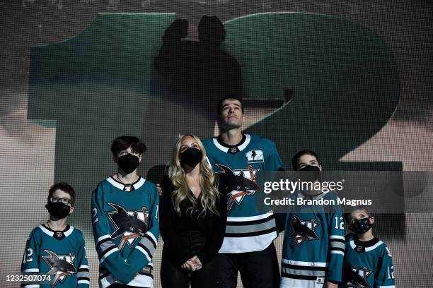 Patrick Marleau of the San Jose Sharks and his family look up at the video board as he is honored for having passed Gordie Howe on the NHLs all-time...