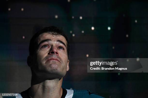 Patrick Marleau of the San Jose Sharks tears up as he looks up at the video board as he is honored for having passed Gordie Howe on the NHLs all-time...